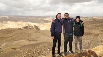 MIT graduate student Nicholas Rivera (middle) and two students from Professor Ido Kaminer's lab visit Masada National Park near the Dead Sea in Israel.Photo courtesy of the researchers.