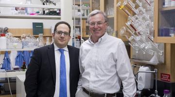 Sahag Voskian SM ’15, PhD ’19 (left) and Professor T. Alan Hatton have developed an electrochemical cell that can capture and release carbon dioxide with just a small change in voltage.Photo: Stuart Darsch