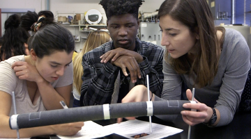 A goal of the MIT 2.001 Guided Discovery Labs is for students to rediscover foundational concepts of mechanics. Instructor Michela Geri (right) guides students Omoruyi Atheka (center) and Aline Vargas as they evaluate how their intuition of torsio...